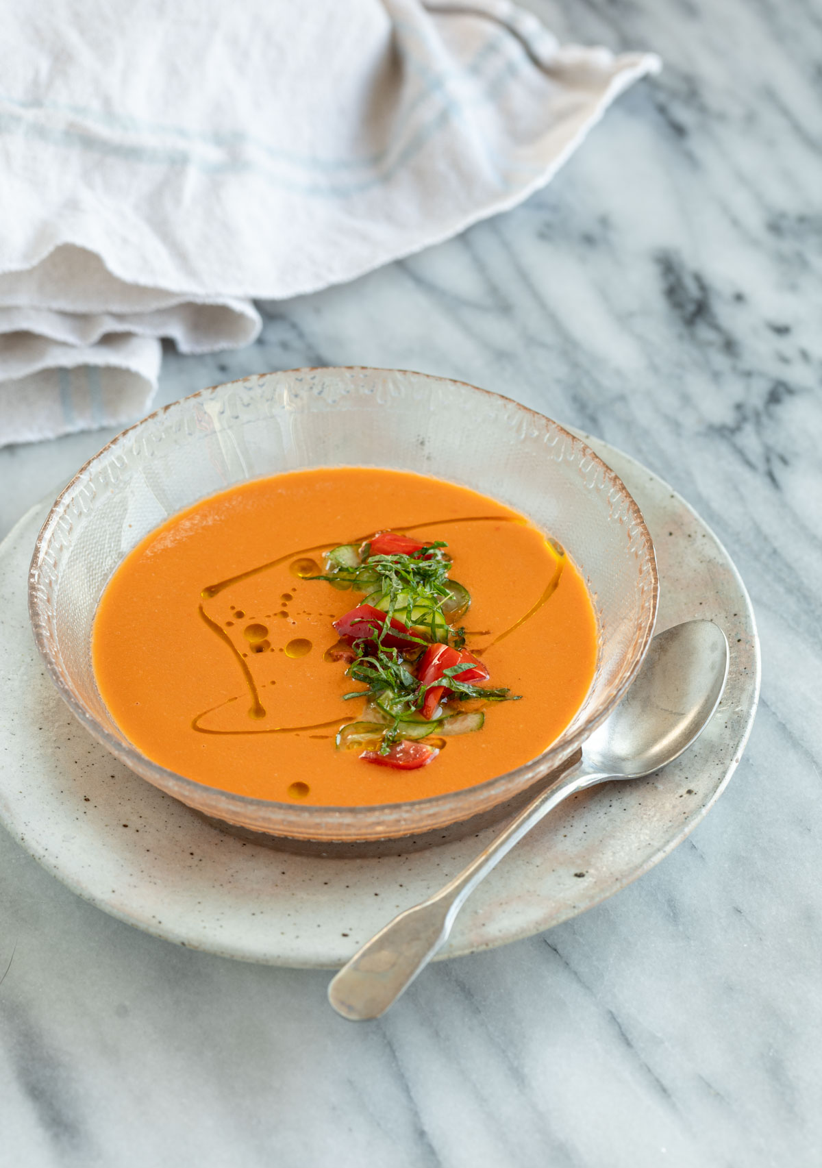 chilled tomato soup with shiso gazpacho in glass bowl
