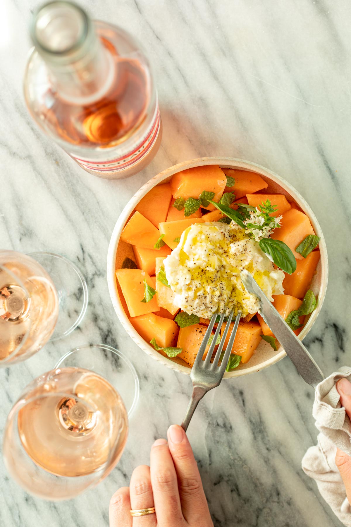 cantaloupe melon and burrata cheese with rose wine